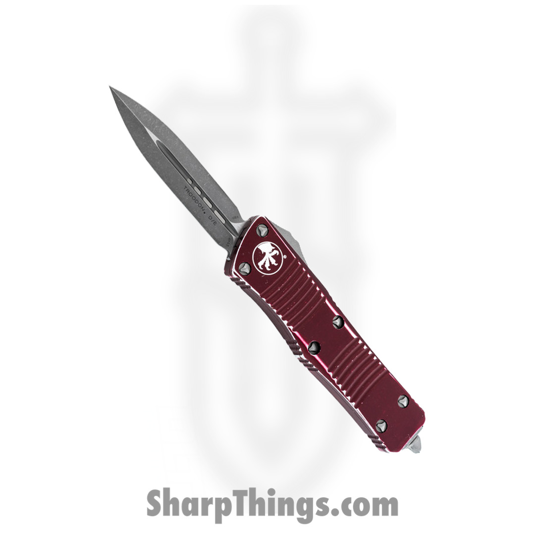 0323423d-60db-47b1-bdd3-73d4fc095488_138-10DMR_1.jpg Microtech - 138-10DMR - Combat Troodon - OTF Auto - Elmax, M390, 204P Apocalyptic Dagger - 6061-T6 Aluminum - Distressed Merlot - Image 1