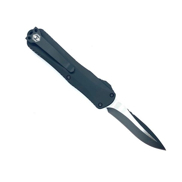0999e58f-fd97-439f-9dd6-c576ee5a2b0e_H029-10A-T_1.webp Heretic Knives - H029-10A-T - Manticore E - OTF Auto - Elmax Two Tone Recurve - 6061-T6 Aluminum - Black - Image 1