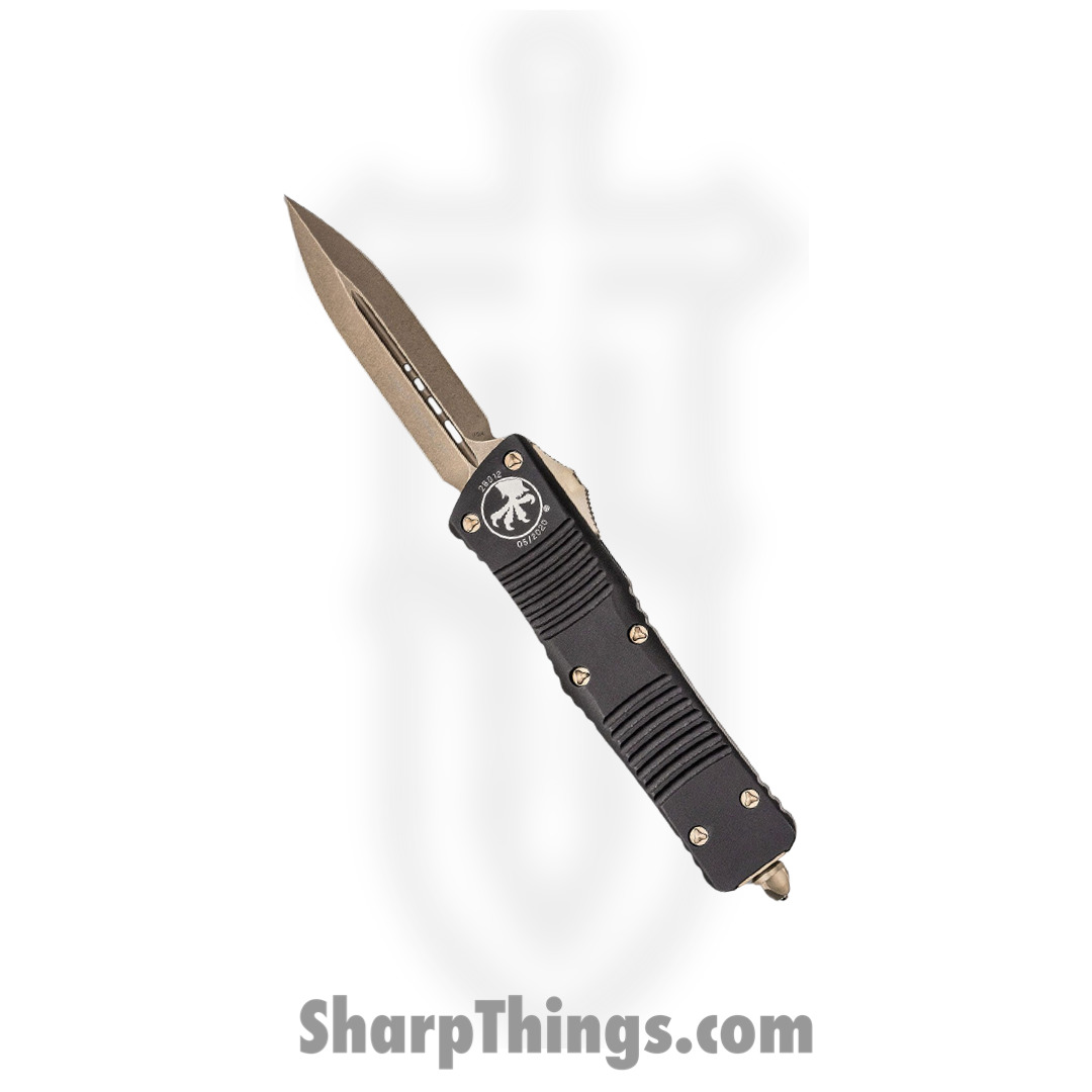 13f2f5af-489f-40ff-a461-ad2528de0b14_142-13_1.jpg Microtech - 142-13 - Combat Troodon - OTF Auto - M390 Bronze Dagger - 6061-T6 Aluminum - Black - Image 1