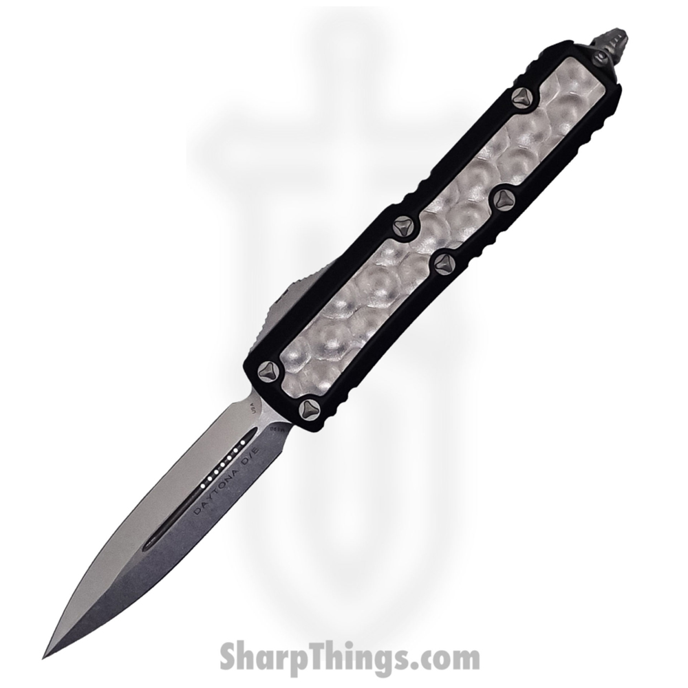 1fd9cdd4-c595-4afa-a75c-b3bf6194882e_126-10BIS_1.jpg Microtech - 126-10BIS - Daytona - OTF Auto - Elmax, M390, 204P Stonewash Dagger - Aluminum/Bubble Titanium Inlay - Black/Silver - Image 1