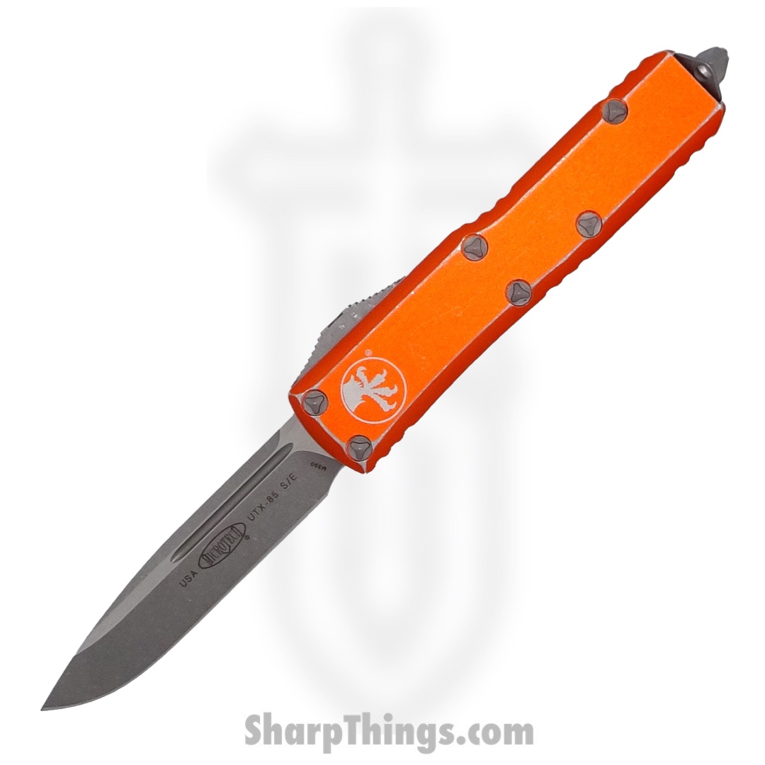 21602661-d790-4e00-8d31-83d3643d190d_231-10DOR_1.jpg Microtech - 231-10DOR - UTX-85 - OTF Auto - Elmax, M390, 204P Apocalyptic Drop Point - 6061-T6 Aluminum - Distressed Orange - Image 1