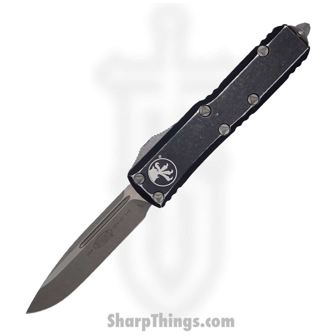 235252ac-845d-4cc5-908d-ed23d13250a9_231-10DBK_1.jpg Microtech - 231-10DBK - UTX-85 - OTF Auto - Elmax, M390, 204P Stonewash Drop Point - 6061-T6 Aluminum - Distressed Black - Image 1