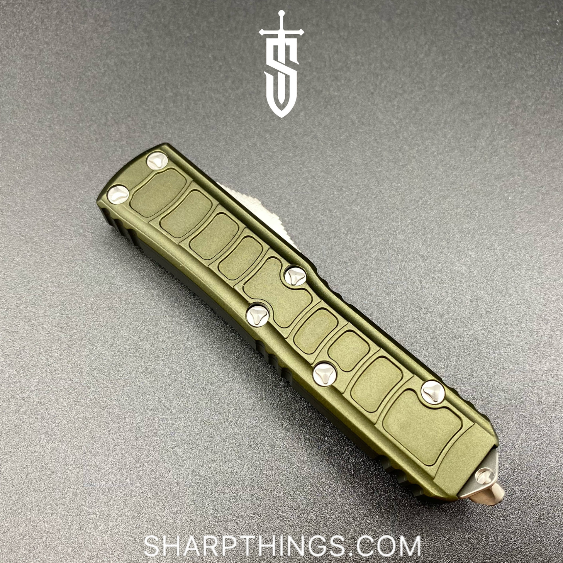 2e898456-7dc5-436d-8ea7-086614ace2cd_231II-4ODS_1.jpg Microtech - 231II-4ODS - UTX-85 II Signature Series - OTF Auto - M390 Satin Drop Point - 6061-T6 Aluminum - OD Green - Image 1