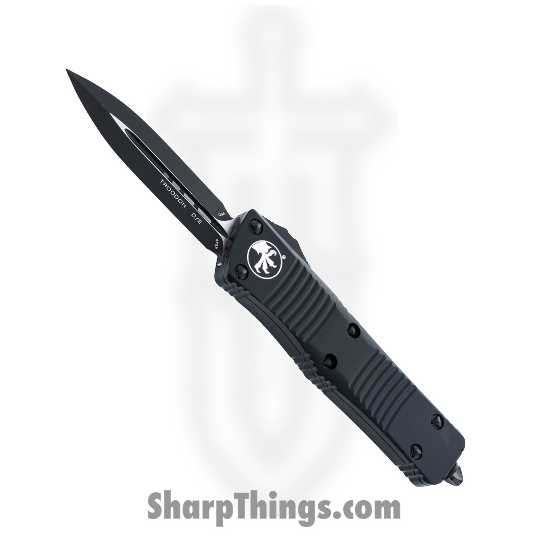301e7b77-9d66-49cb-bee9-4608ab3b5148_138-1T_1.jpg Microtech - 138-1T - Troodon Tactical - OTF Auto - Elmax, M390, 204P Coated Dagger - 6061-T6 Aluminum - Black - Image 1