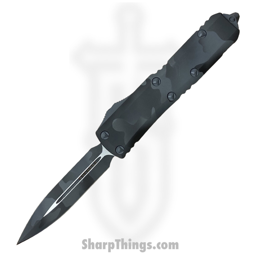 40a6aaa4-405d-4a18-b7c8-6e7347c4230f_232-1UCS_1.jpg Microtech - 232-1UCS - UTX-85 - OTF Auto - Elmax, M390, 204P Coated Dagger - 6061-T6 Aluminum - Urban Camo - Image 1