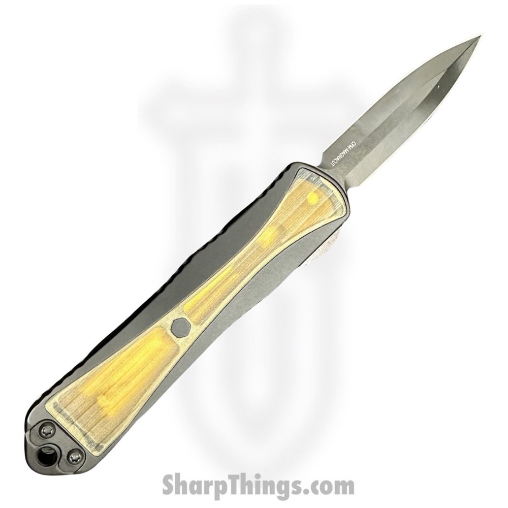 6059ace7-0e24-46b0-98ad-952d86f49dde_H028-6A-ULTEM_1.jpg Heretic Knives - H028-6A-ULTEM - Manticore E - OTF Auto - Magnacut Coated Dagger - 6061-T6 Aluminum/Ultem Inlay - Black/Ultem - Image 1