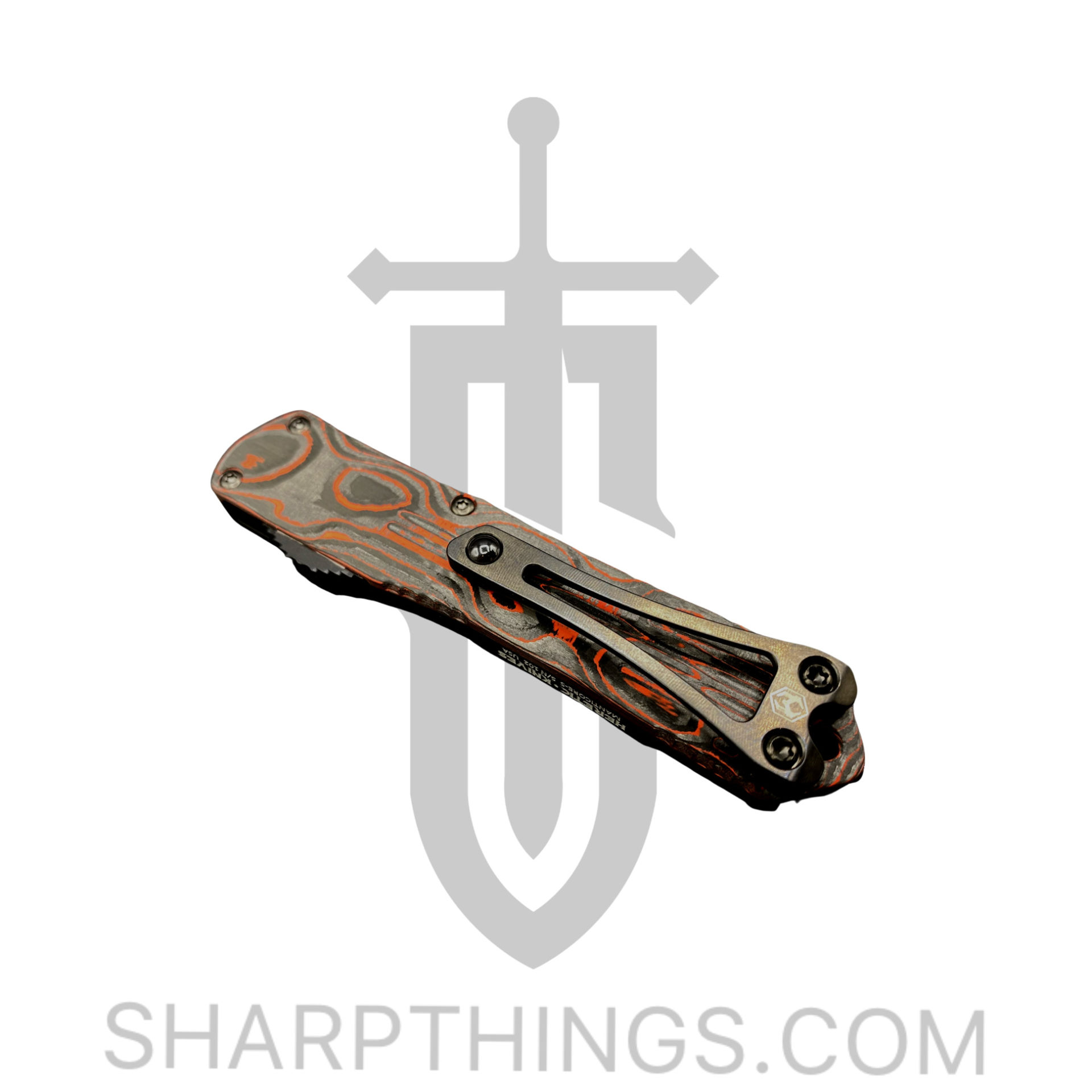 65687a66-d265-4551-99f8-c5deb1936672_H023-6A-ORCF_1.jpg Heretic Knives - H023-6A-ORCF - Manticore S - OTF Auto - Elmax Coated Tanto - Aluminum/Fat Carbon - Black/Orange - Image 1