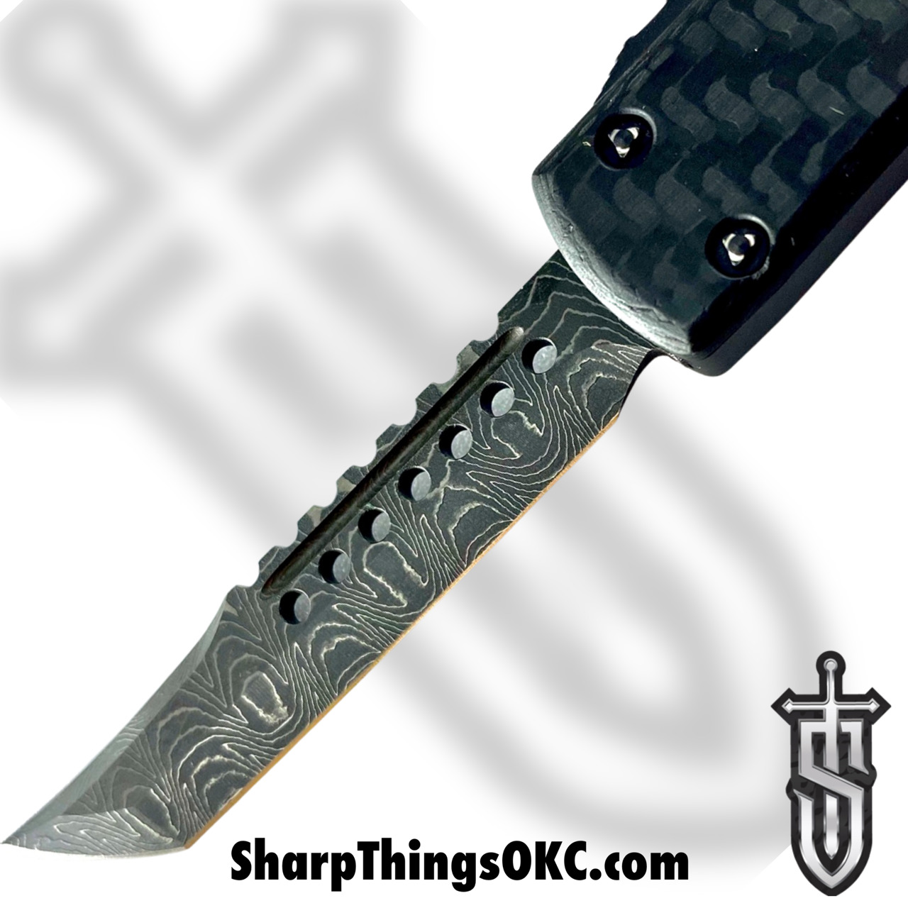 69d66005-f93c-4bea-92d2-be69ed34e95e_419-16CFS_1.jpg Microtech - 419-16CFS - UTX-70 Signature Series - OTF Auto - Damascus Damascus Hellhound Tanto - Carbon Fiber/Aluminum - Black - Image 1