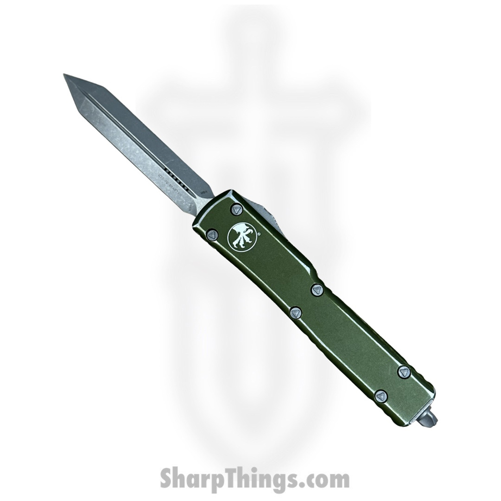 6e70bd80-7ba2-4e2b-9293-3c392a3d6eae_249-10DOD_1.jpg Microtech - 249-10DOD - UTX-70 - OTF Auto - Elmax, M390, 204P Apocalyptic Spartan - 6061-T6 Aluminum - Distressed OD Green - Image 1