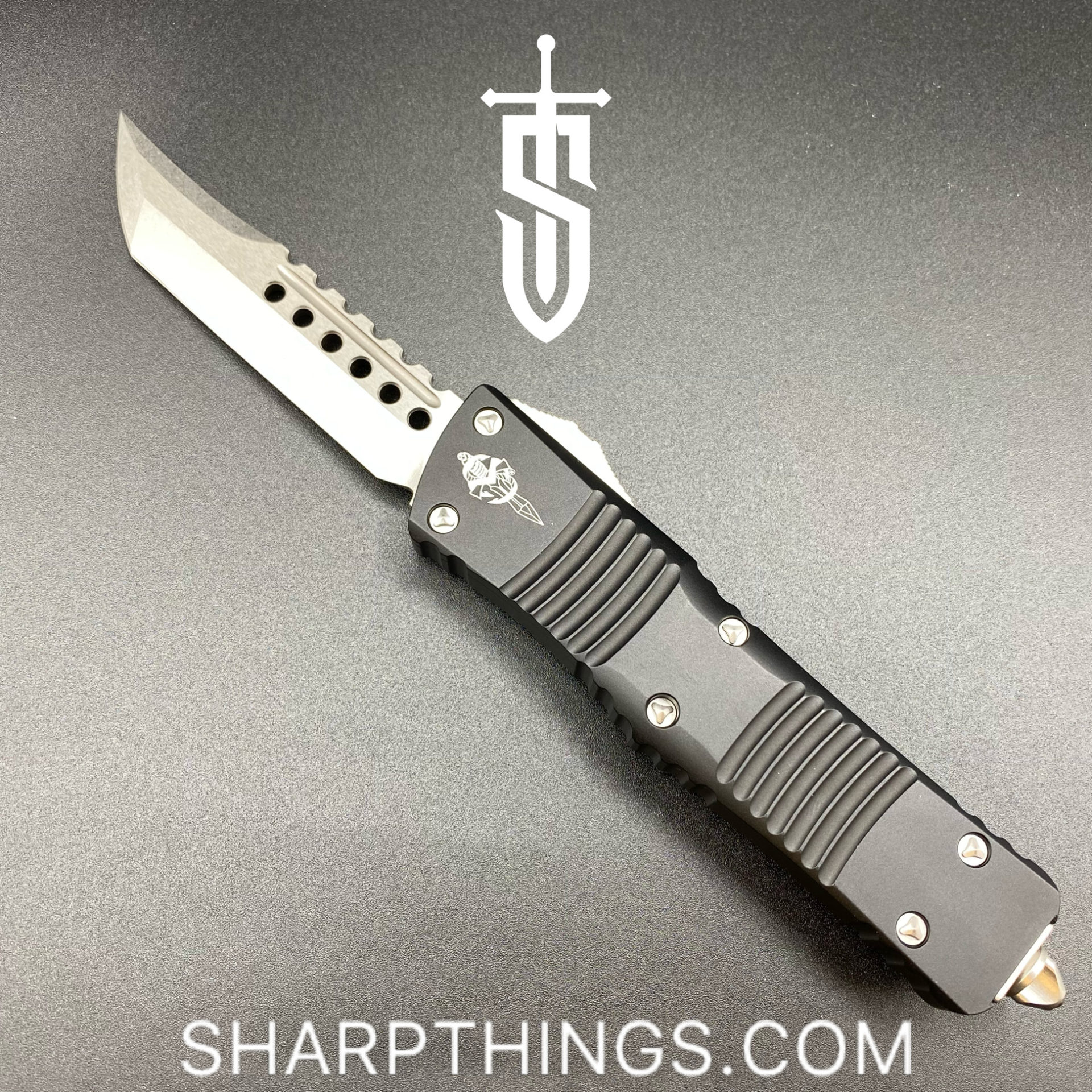 86de2c87-e224-4c6a-a59f-20ce5c1ead79_219-10S_1.jpg Microtech - 219-10S - Combat Troodon Signature Series - OTF Auto - Elmax, M390, 204P Stonewash Hellhound - 6061-T6 Aluminum - Black - Image 1