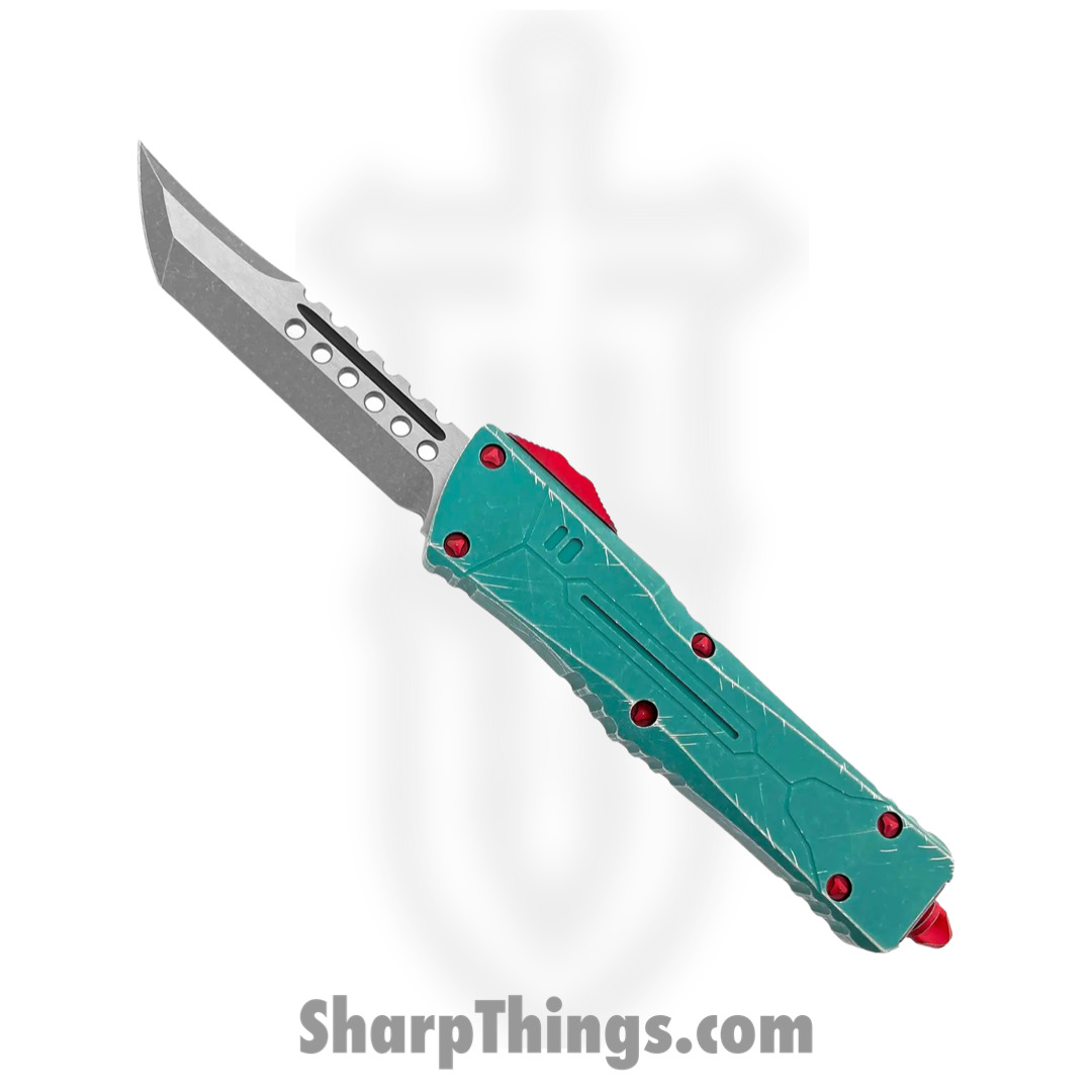 894e16f7-4dc3-4d59-bad2-a3bce83da38b_219-10BH_1.jpg Microtech - 219-10BH - Combat Troodon Bounty Hunter - OTF Auto - M390 Apocalyptic Hellhound Tanto - 6061-T6 Aluminum - Green/Red/Yellow - Image 1