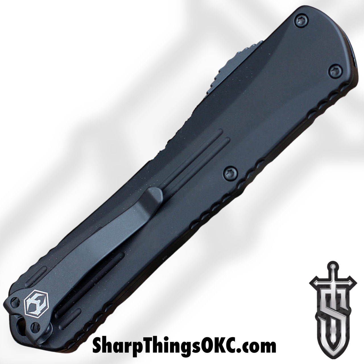 8fd81912-dc29-4a82-a270-342b016d9dcf_H031-10A-T_1.jpg Heretic Knives - H031-10A-T - Manticore X - OTF Auto - Elmax Two Tone Tanto - 6061-T6 Aluminum - Black - Image 1
