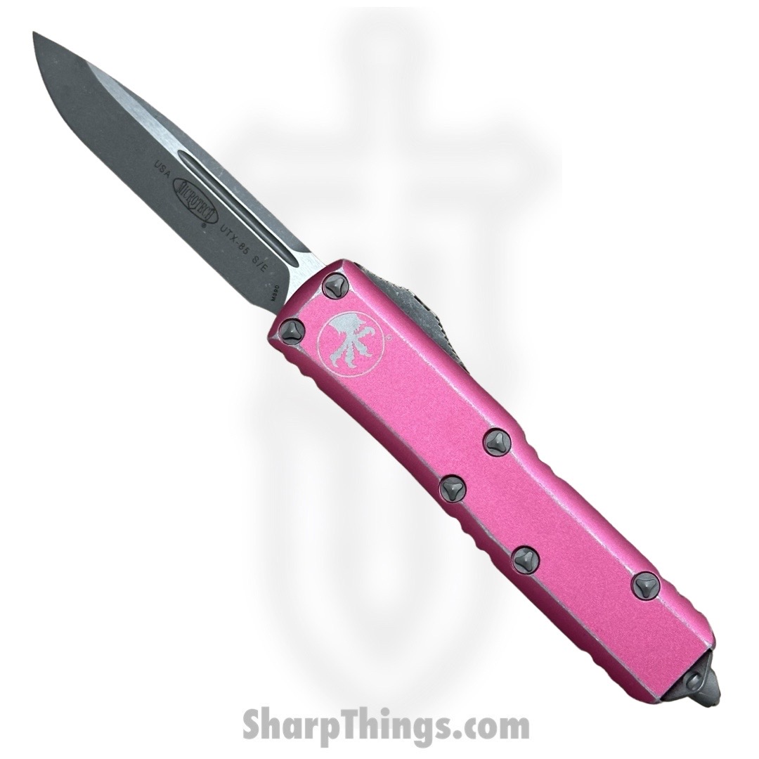 98b9c773-3ec0-415f-84ef-d3d0836314dd_231-10DPK_1.jpg Microtech - 231-10DPK - UTX-85 - OTF Auto - Elmax, M390, 204P Apocalyptic Drop Point - 6061-T6 Aluminum - Distressed Pink - Image 1