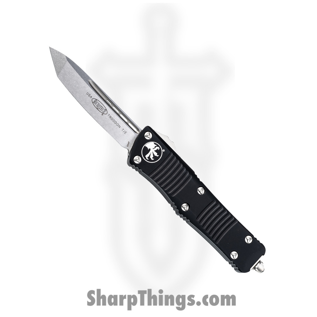 a4c67795-a069-4ea2-9377-9d2a93c3cccd_140-10_1.jpg Microtech - 140-10 - Troodon - OTF Auto - Elmax, M390, 204P Stonewash Tanto - 6061-T6 Aluminum - Black - Image 1
