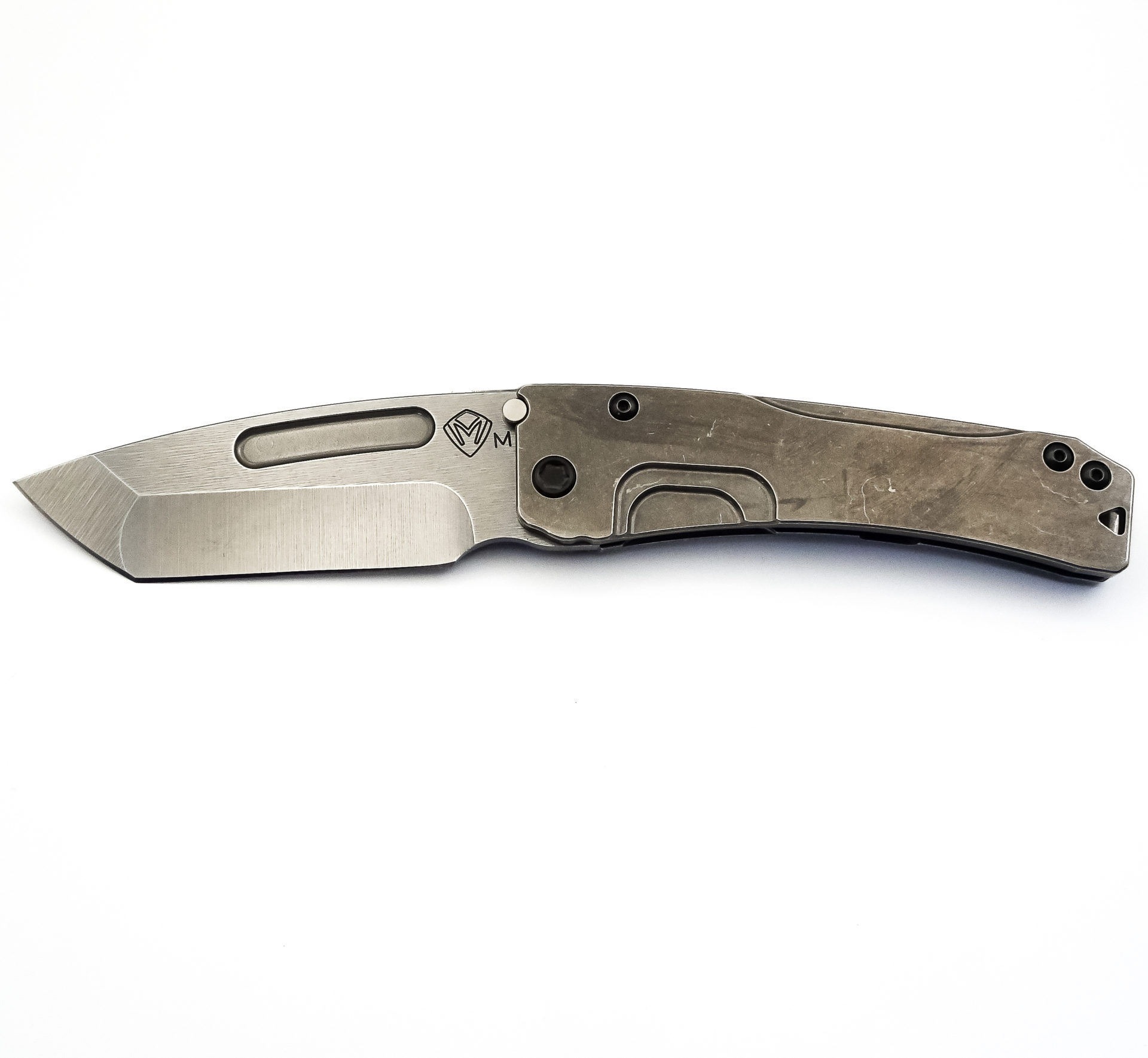 a882995b-9921-4d6d-95bc-fc8ba14c4076_MK201MTT-01TM-TPCP-Q4_1.jpg Medford Knife - MK201MTT-01TM-TPCP-Q4 - Slim Midi Marauder Tanto Folding Knife - Magnacut Titanium - Tumbled - Image 1