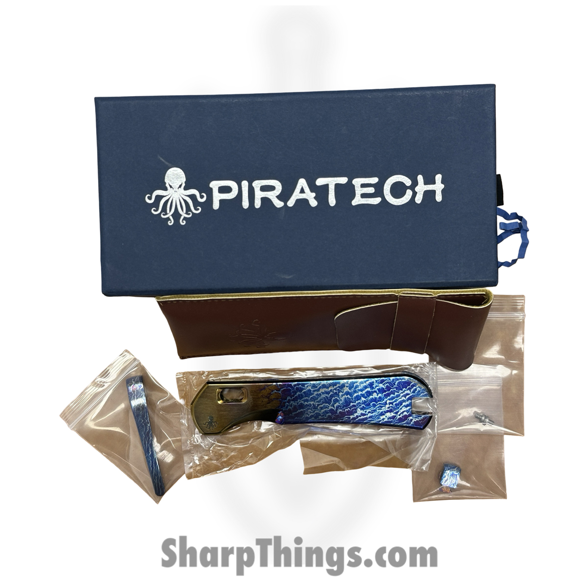 b449c9a9-4f1c-4b84-bb5b-1a3b11de9c78_PIKRAKCRGB_1.jpg Piratech - PIKRAKCRGB - The Kraken - Knife Scales Only - Titanium Mag Snap Scales - Golden Beach & Summer Waves - Image 1