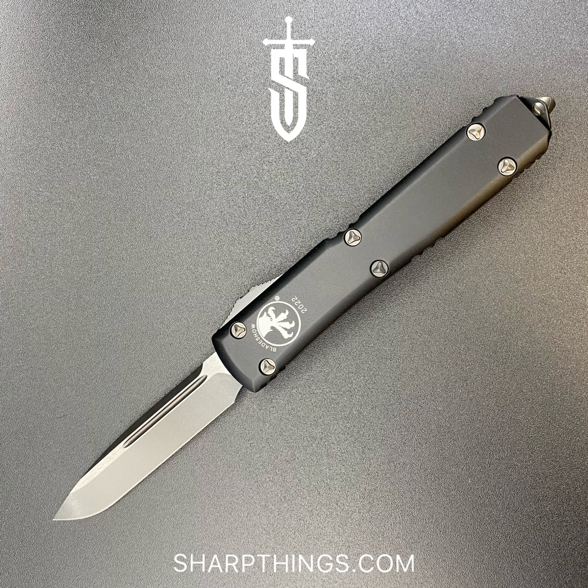 b88719f2-9371-45f5-8d74-b6499009275b_121-1-DLCTBS_1.jpg Microtech - 121-1 DLCTBS - Ultratech Blade Show 2022 - OTF Auto - M390 Coated Drop Point - 6061-T6 Aluminum - Black - Image 1