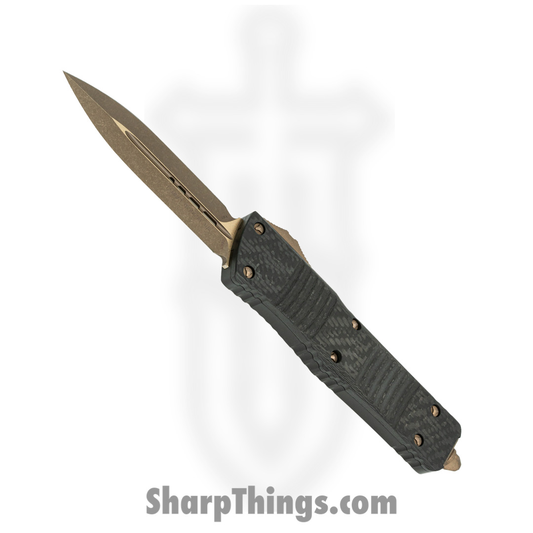 be046df7-73af-43e6-a714-cc03e4b13836_142-13APCFS_1.jpg Microtech - 142-13APCFS - Combat Troodon - OTF Auto - Elmax, M390, 204P Bronze Apocalyptic Dagger - Carbon Fiber/Aluminum - Black - Image 1