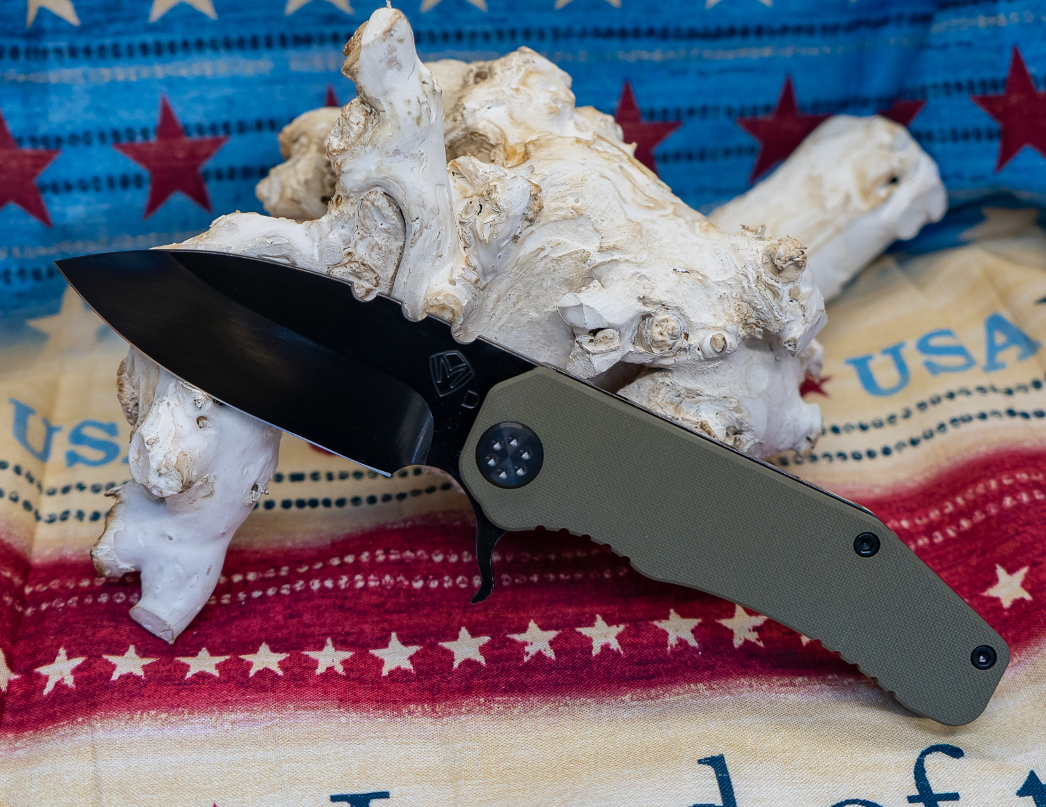 c11a784d-fea5-42a7-9bad-55759be01ac2_MK001DPQ-10PV-TPCP-Q4_1.jpg Medford Knife - MK001DPQ-10PV-TPCP-Q4 - 187 Flipper - PVD D2 G10 - OD Green - Image 1