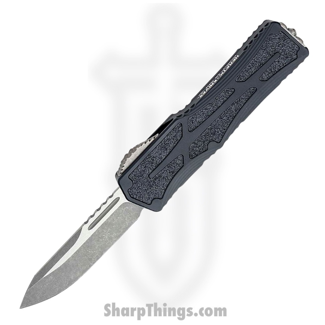 c5506c9b-6450-41b1-8b48-6c4b63ef47c2_H039-5A_1.jpg Heretic Knives - H039-5A - Colossus - OTF Auto - Magnacut Battleworn Clip Point - Aluminum/Traction Inlay - Black - Image 1