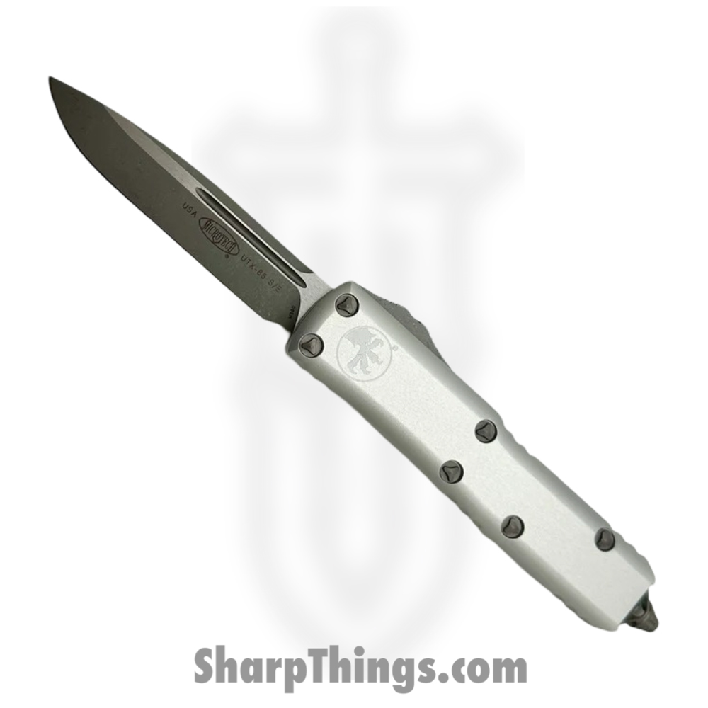 c5ad2a23-1d99-4895-88f7-d433d6c0c004_231-10APCR_1.jpg Microtech - 231-10APCR - UTX-85 - OTF Auto - M390, 204P, Elmax, or XHP Apocalyptic Drop Point - Aluminum - Clear - Image 1