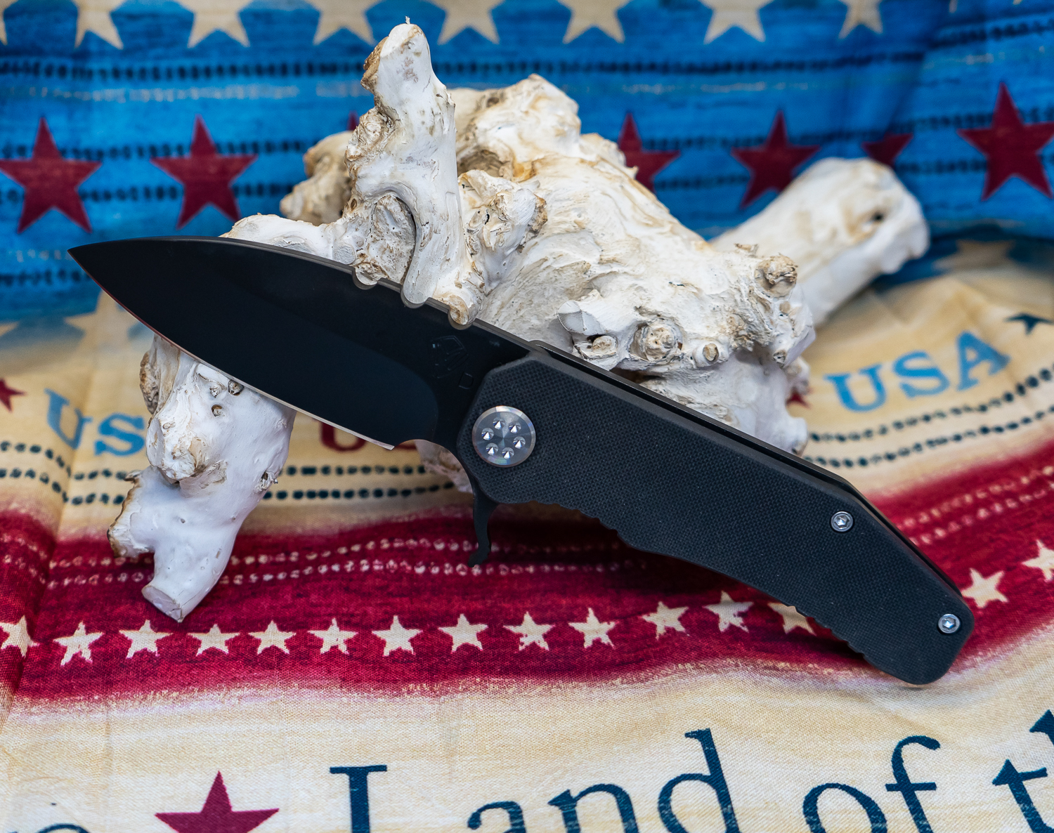 c87b53c8-1437-45ff-861f-8b554ed10aa3_MK001DPQ-08PV-TSCS-Q4_1.jpg Medford Knife and Tool - MK001DPQ-08PV-TSCS-Q4 - 187 Flipper - Folding Knife - PVD D2 Drop Point - G10 - Black - Image 1