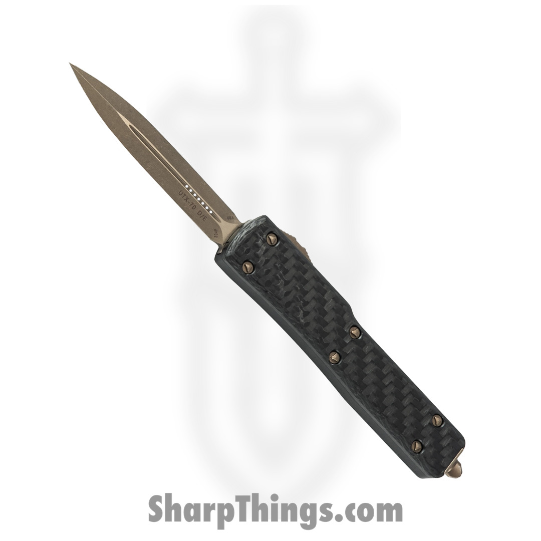 d778afbf-9f8d-472f-b183-8c9a49d61717_147-13APCFS_1.jpg Microtech - 147-13APCFS - UTX-70 Signature Series - OTF Auto - Elmax, M390, 204P Bronze Dagger - Carbon Fiber - Black - Image 1