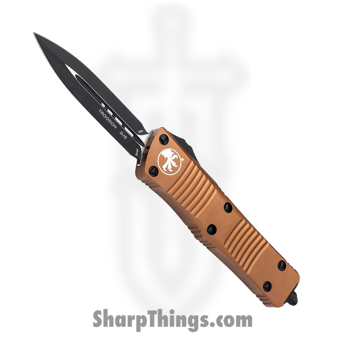 e2e2af8b-6727-4016-9d97-b116565d08e9_138-1TA_1.jpg Microtech - 138-1TA - Troodon - OTF Auto - Elmax, M390, 204P Coated Dagger - 6061-T6 Aluminum - Tan - Image 1