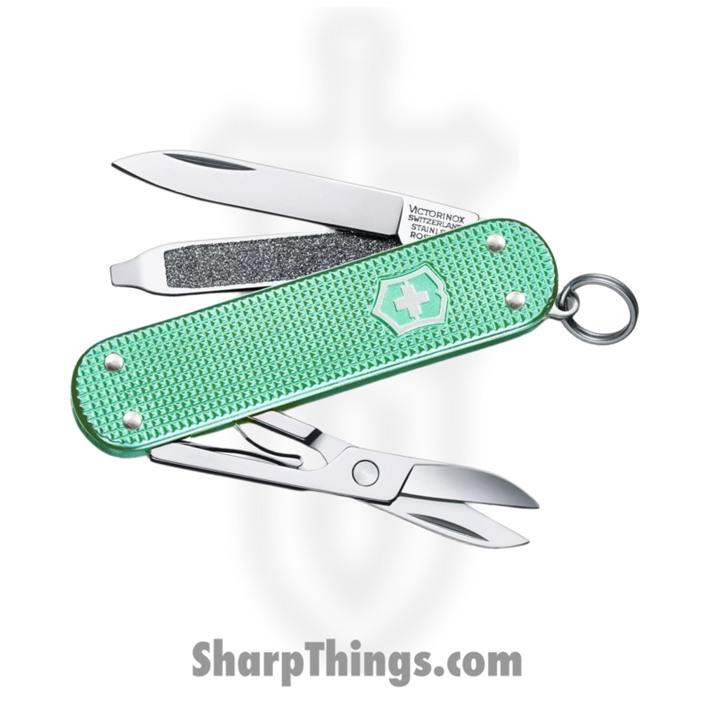 30683fcd-6161-489d-b877-2b017acb2a6e_VN06221221G_1.jpg Victorinox - VN06221221G - Classic SD - Folding Knife - Stainless Polished Multi - Alox - Minty Mint - Image 1