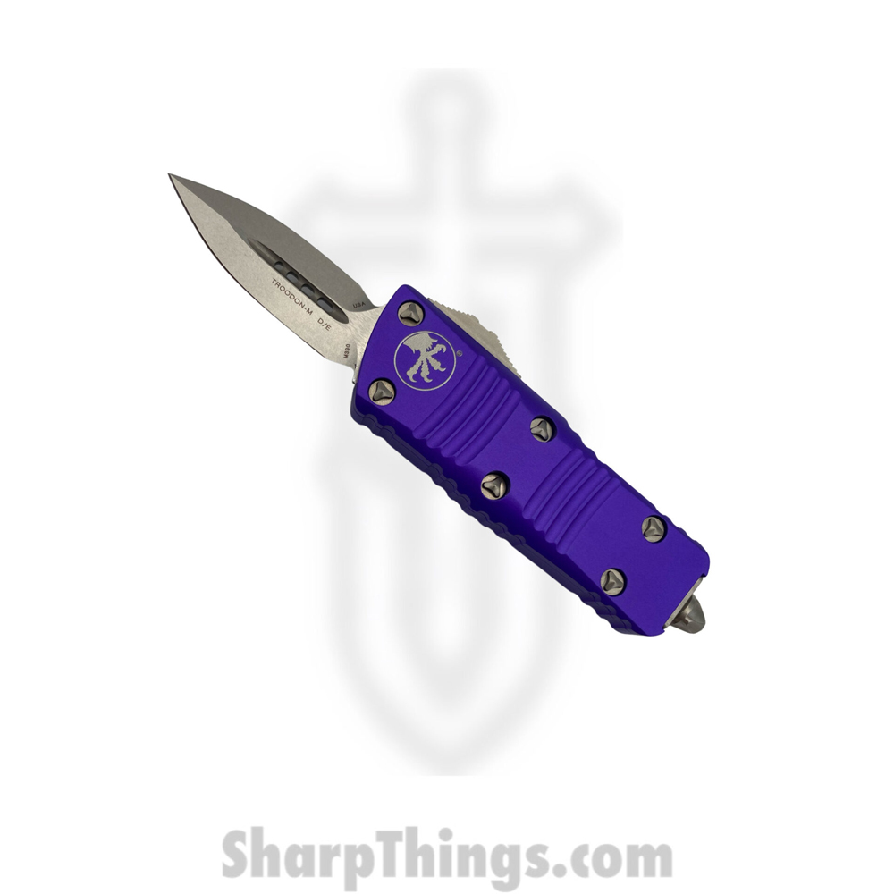 a8eda890-477f-4ac4-b073-e085181219c6_238-10PU_1.jpg Microtech - 238-10PU - Mini Troodon - OTF Auto - M390 Stonewash Dagger - 6061-T6 Aluminum - Purple - Image 1