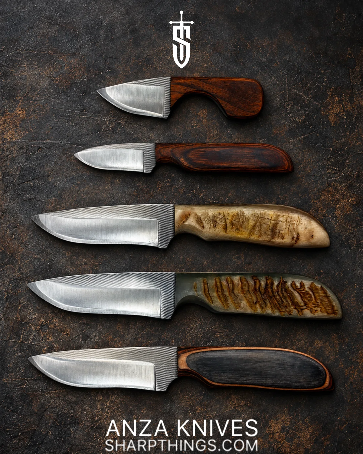 Five ANZA file knives with walnut, mixed wood and sheep horn handles laid out on a dark surface